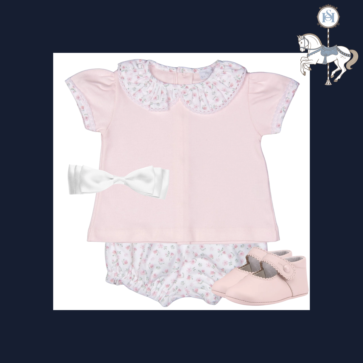 A baby girl's three-piece outfit set featuring a light pink short-sleeve top with a floral-patterned Peter Pan collar, matching floral bloomers, a white bow headband, and a pair of light pink Mary Jane shoes, displayed on a white background with a dark navy border.