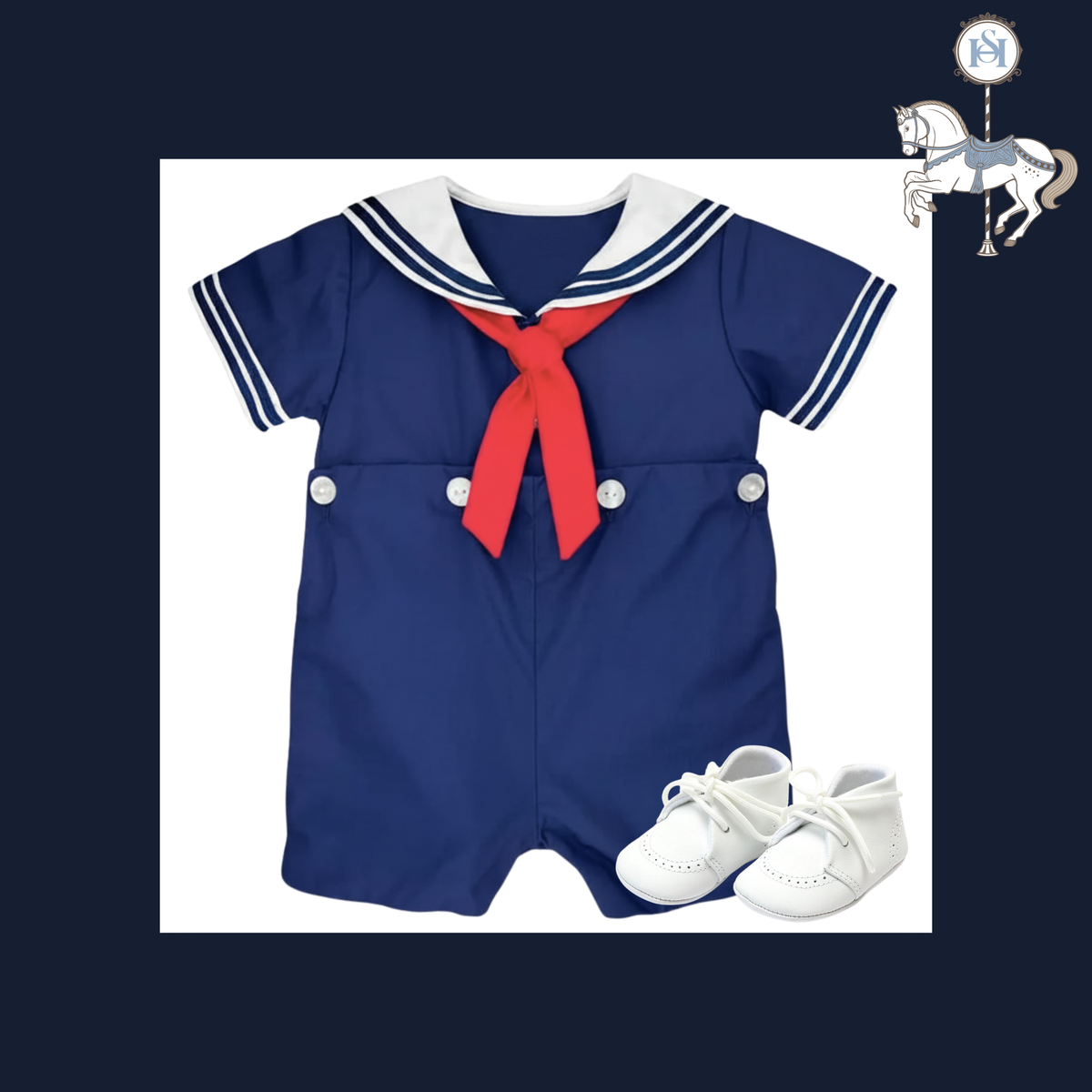 A baby romper set featuring a navy blue short-sleeve romper with a white sailor collar, a red necktie, and white buttons, shown with a pair of white baby moccasins on a white background with a dark blue border.