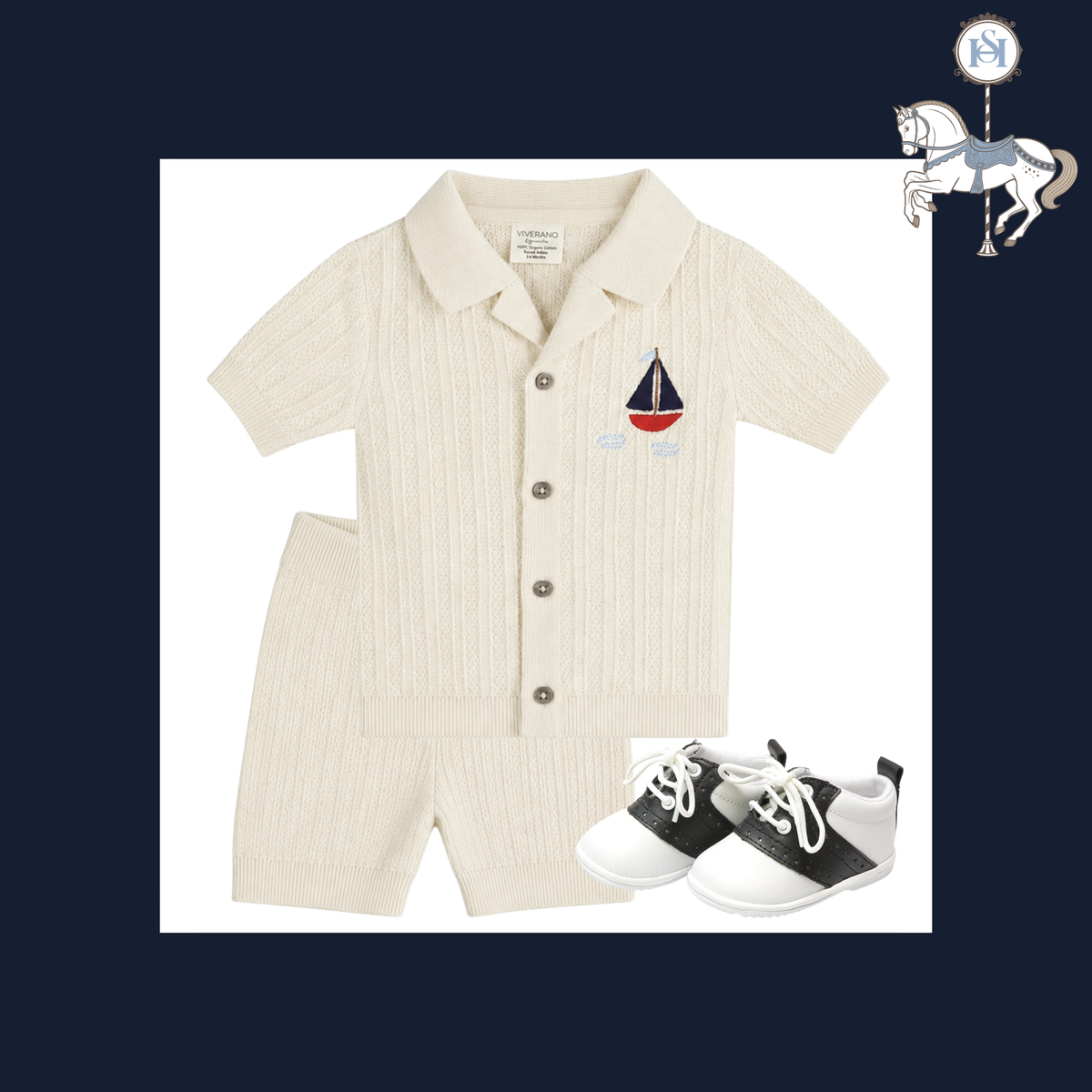 A baby boy's two-piece knit romper set in cream, featuring a short-sleeve button-up shirt with a collar and a matching pair of shorts. The shirt has a small embroidered sailboat on the left chest.