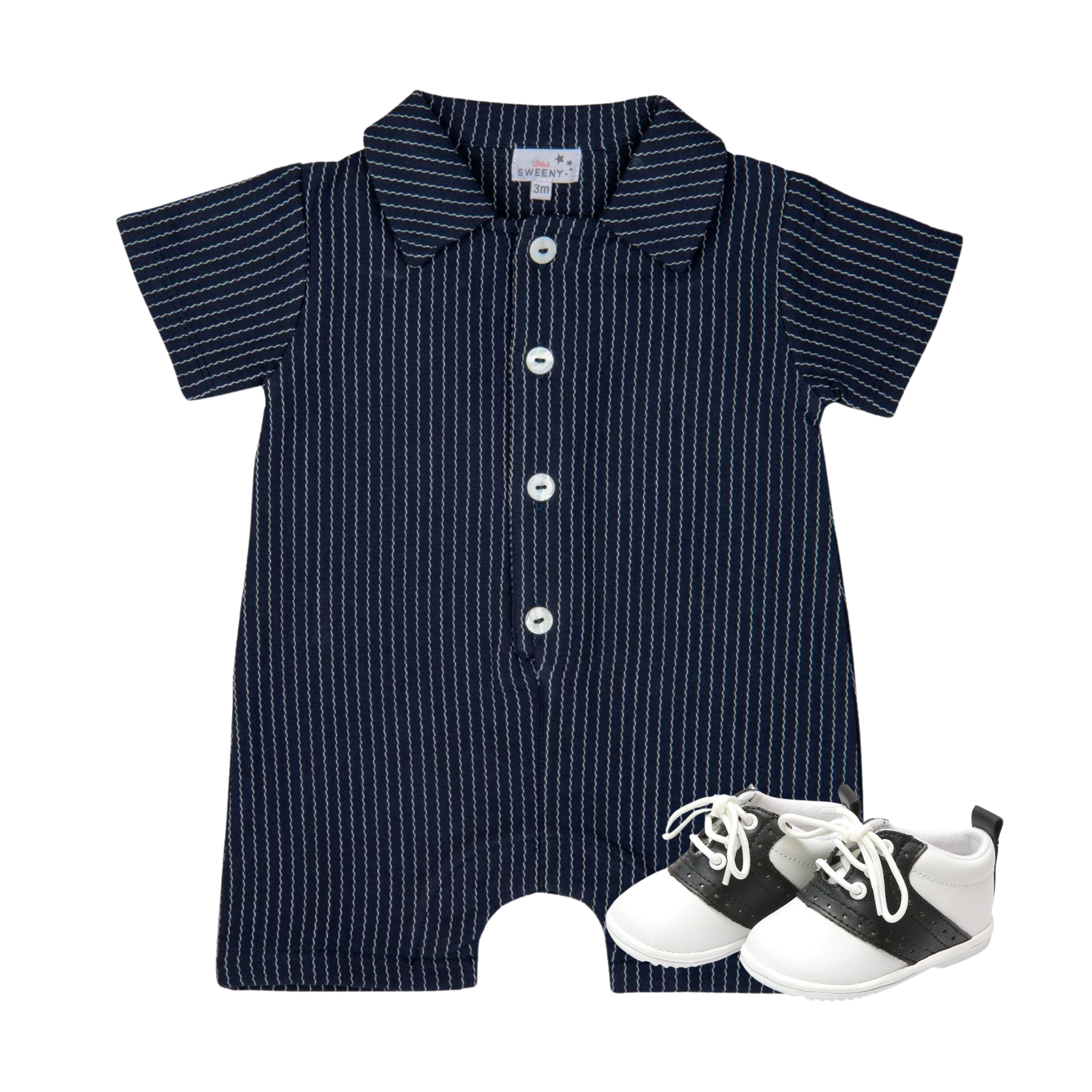 A baby short-sleeve romper in navy blue with thin white vertical pinstripes, featuring a button-down front and a collar, shown with a pair of black and white baby shoes on a plain white background.