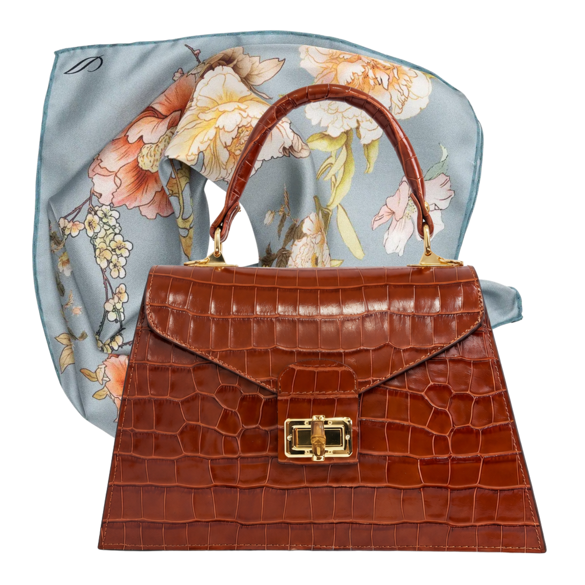 The Signora pairing: cognac crocodile-effect leather handbag with a powder blue floral silk bandana